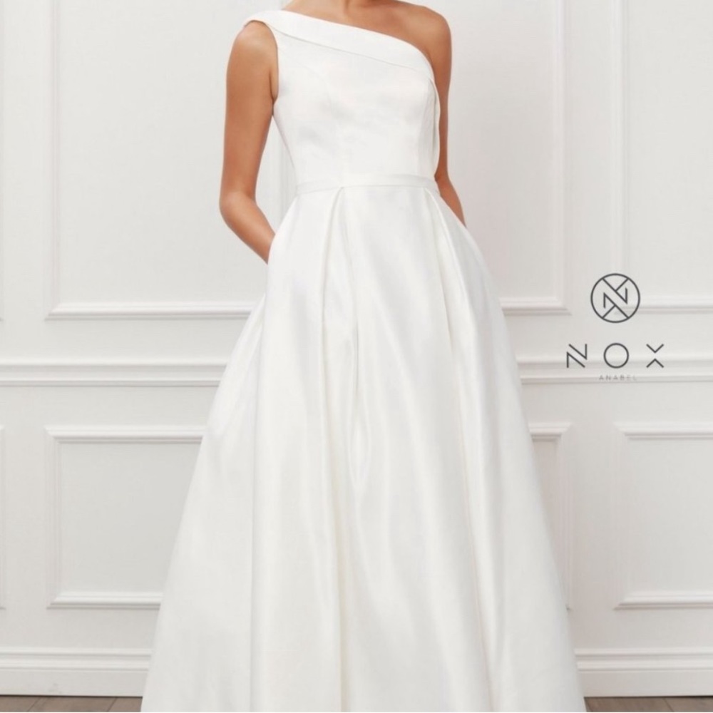 white, one shoulder gown